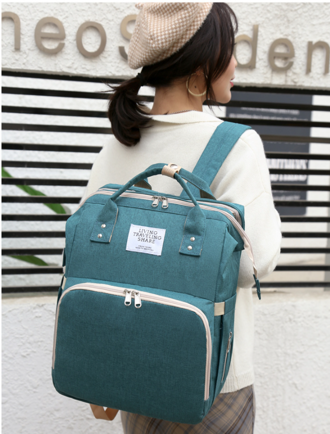 عرض نموذج لحقيبة الحفاض حقيبة الظهر